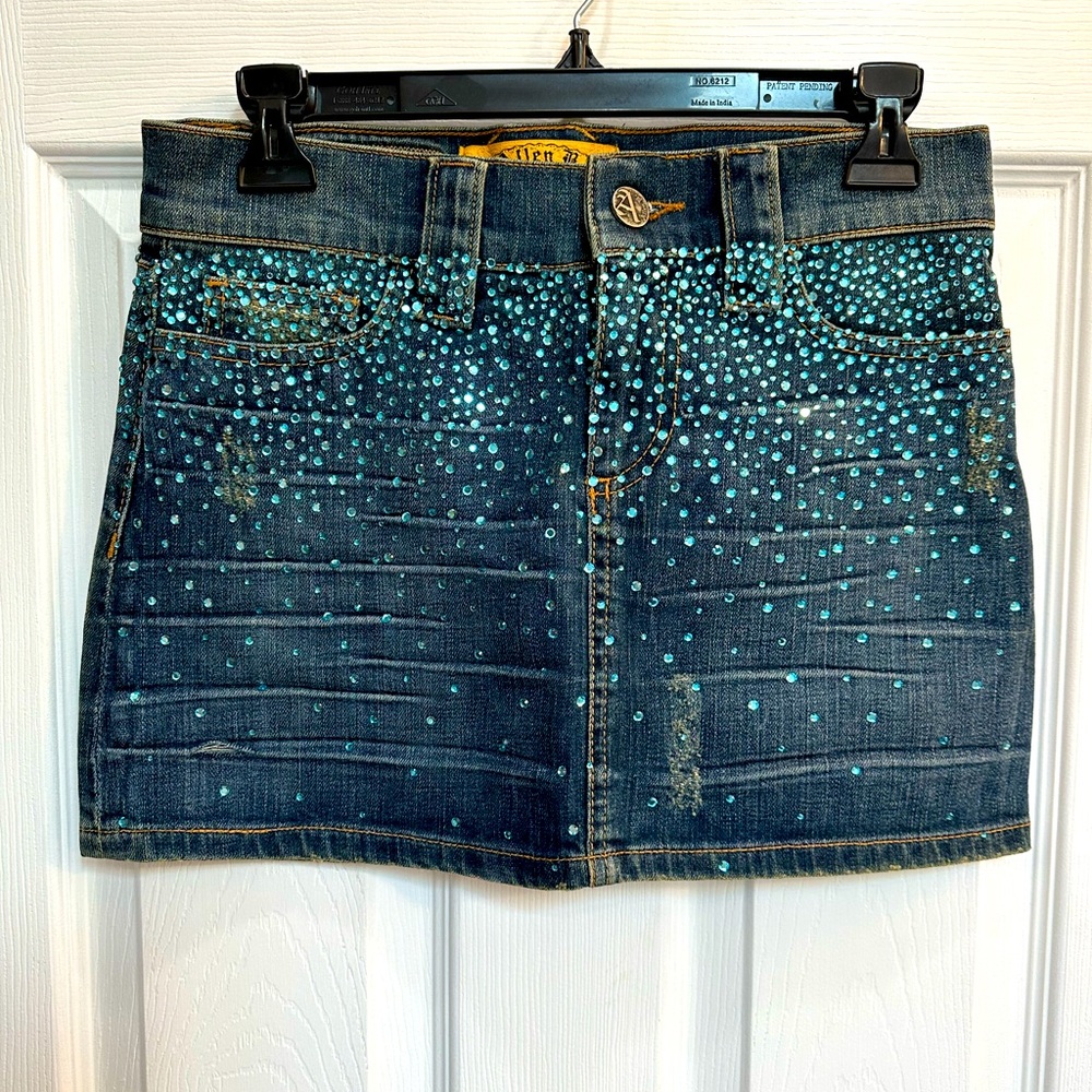 Allen B by Allen Schwartz distressed denim skirt with turquoise rhinestones